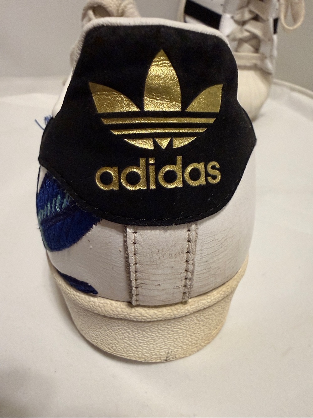 adidas White Sneakers with Black Stripes and Blue Floral Detail - Picture 3 of 5